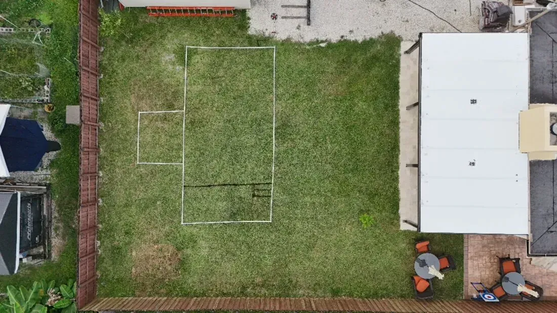 Aerial view of the original yard before the outdoor living build