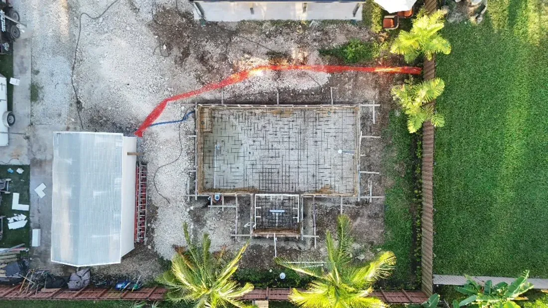 Construction of hardscape and structures during the build