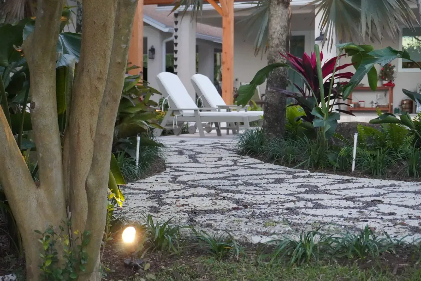 Stone landscaping with palms